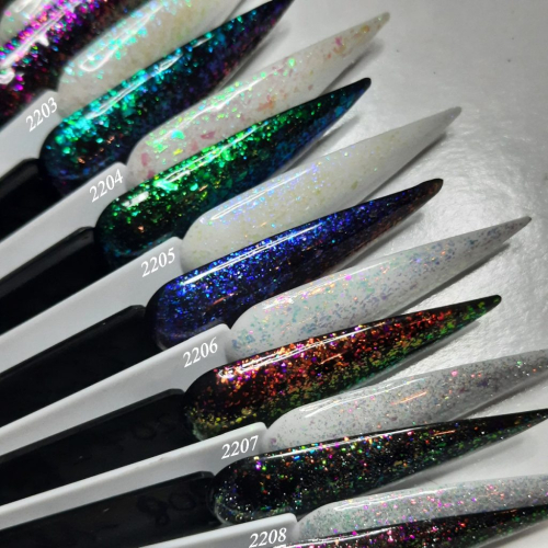 Preview: Regenbogen Flocken UV Gel auf schwarzem Untergrund